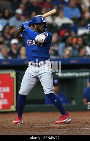 Texas Rangers right fielder Adolis Garcia (53) runs back to the dugout  after the end on an inning during a baseball game on Saturday, April 22,  2023, in Arlington, Texas. (AP Photo/Richard