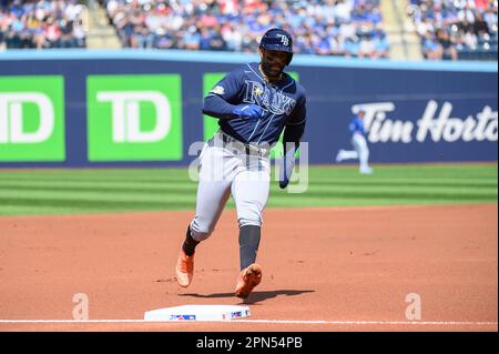 Tampa Bay Rays' Yandy Diaz steps into the batters box, wearing a rainbow  arm band as the Rays celebrate Pride day, during a baseball game against  the Texas Rangers Saturday, June 10