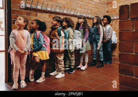 Group of primary Pupils Outside Classroom Stock Photo - Alamy