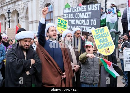 London, UK. 16th April, 2023. The Al-Quds march took place between the home Office and Whitehall, held close to final Friday of Ramadan annually. The event was begun to oppose discriminatory Israeli policies, Zionism and show solidarity with the people of Palestine. A small Israeli counter-protest was kept separated from the march by police officers. Credit: Eleventh Hour Photography/Alamy Live News Stock Photo