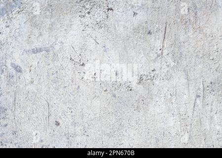Cement wall surface, abstract light gray background. Concrete grunge texture, stucco. Loft style. Natural old rough floor. Template with empty space Stock Photo
