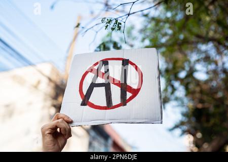Demonstrator holding "No AI" placard Stock Photo