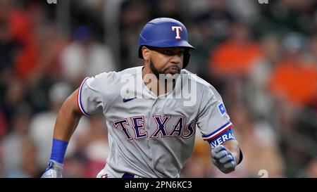 Texas Rangers' Leody Taveras sprints around third during a