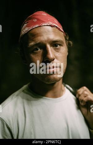Emotional close-up portrait of a handsome young man. Stock Photo