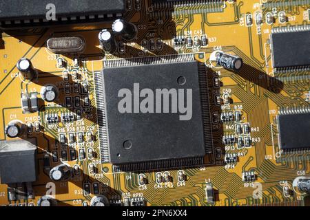 Electronic circuit board with processor. Blank surface chip. Stock Photo