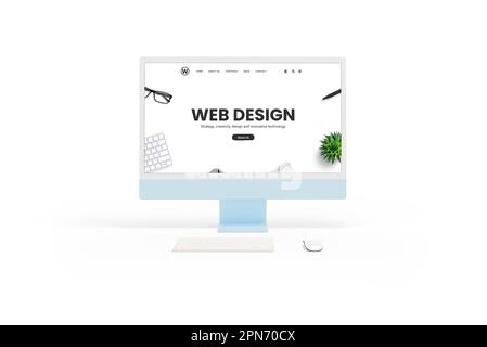 Isolated white computer display monitor with a web design studio concept page in front view. Keyboard and mouse beside. Showcasing website design conc Stock Photo