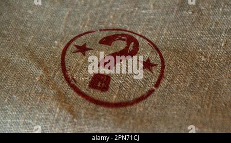 Question mark stamp printed on linen sack. Faq help query and answer concept. Stock Photo