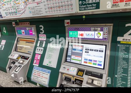 April 2023 Tokyo subway entree trains and ticket machine on TOEI subway line to purchase train tickets before travel,Japan,Asia Stock Photo