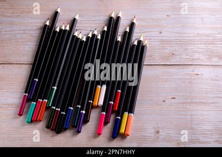 photo of different pencils lying on the table Stock Photo