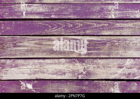 Wooden background. Old purple painted wooden plank surface, aged weathered cracked boards. Grunge shabby texture, wallpaper, backdrop Stock Photo