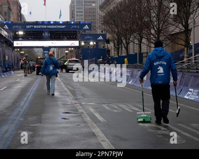 Boston, Massachusetts, USA. 17th Apr, 2023. Workers put the final touches on finish line of the 127th Boston Marathon. Ten years ago, a bomb blast at that location killed three and injured scores of others. This year nearly 30,000 runners will run the 26.2 mile course, coming from more than 100 countries. (Credit Image: © Sue Dorfman/ZUMA Press Wire) EDITORIAL USAGE ONLY! Not for Commercial USAGE! Credit: ZUMA Press, Inc./Alamy Live News Stock Photo