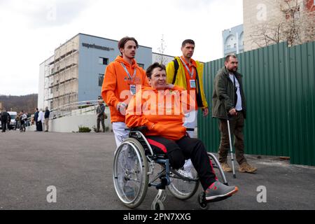 Non Exclusive: LVIV, UKRAINE - APRIL 14, 2023 - People head for the opening of the Superhumans Prosthetics and Rehabilitation Medical Centre, Lviv, we Stock Photo