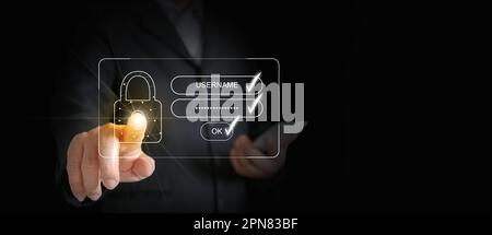 A businessman's finger tapping or activating a virtual digital padlock for safe online account access, after entering his username and password. Cyber Stock Photo