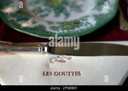 Single place table setting. Knife and napkin.    Burgundy. France. Stock Photo