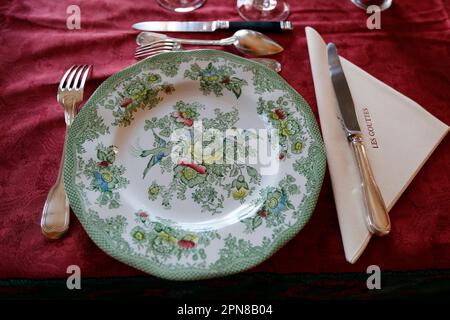 Single place table setting, knife fork plate.    Burgundy. France. Stock Photo