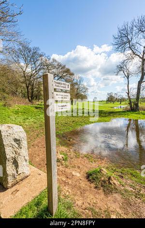 The start of the Thames Path long distance walking trail at the source of the River Thames at Thames Head on the Cotswolds near Kemble, Gloucestershir Stock Photo