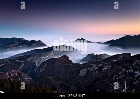 Vicenza Pre-Alps. From left to right: the Tonezza del Cimone plateau, Mount Tormeno and the slopes of Mount Toraro. Arsiero, Veneto, Italy. Stock Photo