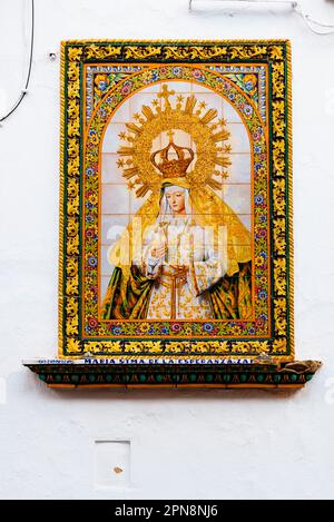 Niche with the tiled image of the Virgin of Hope, Virgen de la Esperanza. Convent courtyard. Convent of Santa Clara de Zafra is home to the Museum of Stock Photo