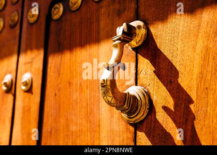 Door knocker detail. Manor house door. Zafra, Badajoz, Extremadura, Spain, Europe Stock Photo