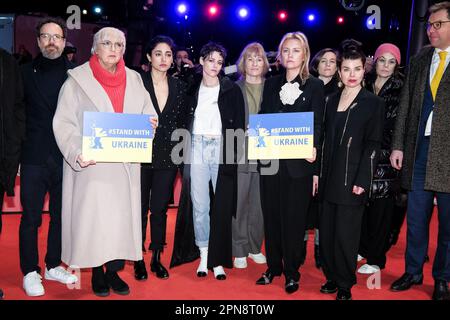 Kristen Stewart, Minister of State for Culture and the Media Claudia Roth and Ukrainian Ambassador Oleksii Makeiev photographed attending the Demonstration of Solidarity with Ukraine on the Red Carpet during the Berlin International Film Festival at Berlinale Palast in Berlin, Germany on 24 February 2023 . Picture by Julie Edwards. Stock Photo