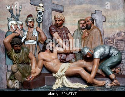 St Joseph's church. Way of the cross. Station 11. Jesus is nailed