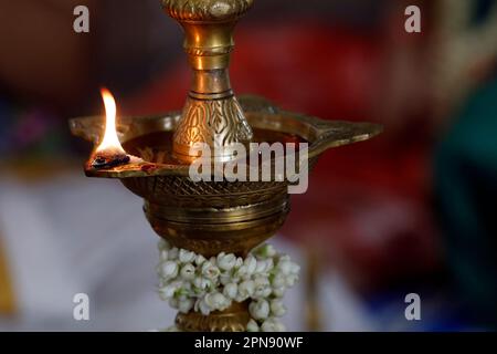 Sri Srinivasa Perumal hindu temple. Indian traditional Samai or Samayee, a typical shape of diya (lamp) usually made up of brass. Singapore. Stock Photo