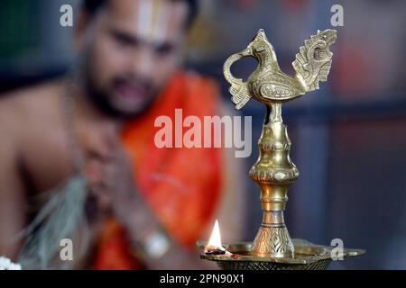 Sri Srinivasa Perumal hindu temple.  Indian traditional Samai or Samayee, a typical shape of diya (lamp) usually made up of brass. Singapore. Stock Photo