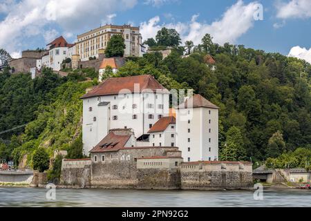 Veste Niederhaus, castle at the confluence of rivers Danube and Ilz, in front of Veste Oberhaus fortress in Passau, Bavaria, Germany Stock Photo