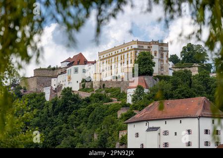Veste Niederhaus, castle at riverbanks of the Danube, in front of Veste Oberhaus fortress in Passau, Bavaria, Germany Stock Photo