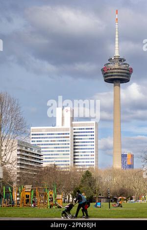 Colonius TV Tower rising high above city skyline on a bright spring day Stock Photo