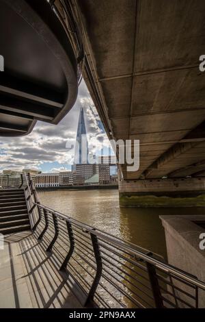 Architectural semi abstract view along the River Thames, London, with the Shard as a focal point. Good sky, high resolution with negative space Stock Photo