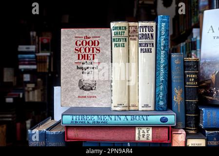 Books on display in the window of a secondhand bookkshop in Edinburgh, Scotland, UK. Stock Photo