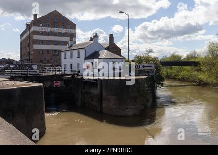 Gloucester, UK. 13th April, 2023. Gloucester Lock and the Lock Warehouse are pictured at Gloucester Docks. The Lock Warehouse was built in 1834 for leading corn merchants J & C Sturge. Historic Gloucester Docks, Britain's most inland port, are located at the northern junction of the River Severn with the Gloucester and Sharpness Canal. Credit: Mark Kerrison/Alamy Live News Stock Photo