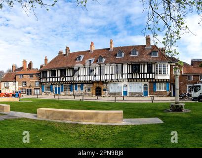 ST WILLIAM'S COLLEGE, YORK, UK - APRIL 17, 2023. The exterior of St William's College building and park next to York Minster which is a popular touris Stock Photo