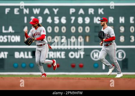 Los Angeles Angels' Brett Phillips fields a base hit by Texas Rangers'  Bubba Thompson during the xx inning of a spring training baseball game,  Saturday, March 18, 2023, in Tempe, Ariz. (AP