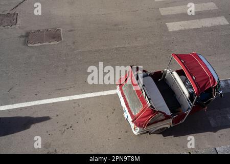 Top view of the traditional 3-wheeled Ape taxi parked in the center of Palermo, Sicily Stock Photo