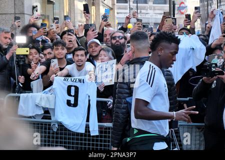 London, UK. 17th Apr, 2023. Real Madrid forward Vini JR walks past fans as the team leaves their hotel for a press conference and training session ahead of the quarter-finals of the Champions League, where they face Chelsea on Tuesday evening at Stamford Bridge. Credit: Eleventh Hour Photography/Alamy Live News Stock Photo