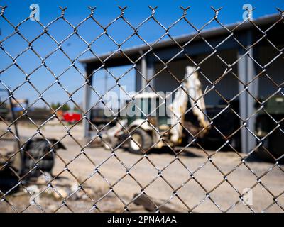 Chain Link Fence by construction site Stock Photo