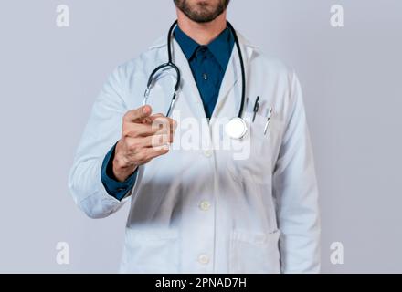 Doctor hand pointing at you isolated. Unrecognizable doctor pointing fingers at you, Young doctor pointing fingers at camera isolated Stock Photo