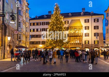 Innsbruck at Christmas time, festively illuminated city centre with Goldenes Dachl and Christmas tree, Innsbruck, Tyrol, Austria Stock Photo