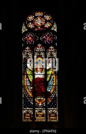 Stained glass window with Jesus at the blessing with biblical quote : I am the way and the truth and the life, John 14, 6, Gospel, biblical Stock Photo