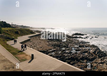 Porto Homem do Leme Beach Picturesque View with Walking People on a Sunny Blue Sky Day, portugal - sep 2022. High quality photo Stock Photo