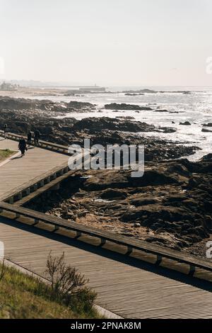 Porto Homem do Leme Beach Picturesque View with Walking People on a Sunny Blue Sky Day, portugal - sep 2022. High quality photo Stock Photo