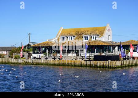 View of the Rise riverside restaurant in the town near the harbour, West Bay, Dorset, UK, Europe. Stock Photo