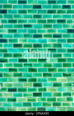 shiny glazed green tiles in a brick pattern on a wall in albufeira algarve portugal Stock Photo