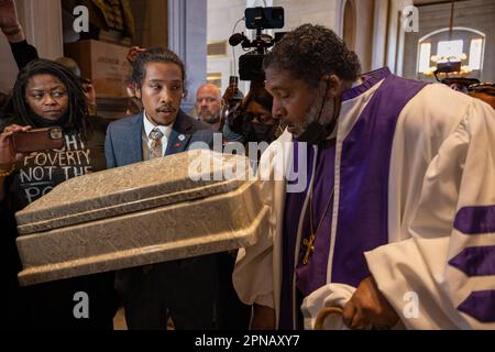 NASHVILLE, TENNESSEE - APRIL 17: U.S. Rep ?Justin Jones (??D-Nashville?)? attempts to bring an empty casket into the Tennessee Capitol chamber with Bishop William Barber II, during a ?'Moral Monday?'? rally to address gun violence on April 17, 2023 in Nashville, Tennessee. In the wake of the March shooting at The Covenant School, in the Green Hills neighborhood of Nashville, organizations have mobilized around U.S. Rep ?Justin Jones? (?D-Nashville?), and ?U.S. Rep ?Justin J. Pearson? (??D-Memphis?)? ?who ?have drawn? ?national attention? ?pushing for gun safety laws. (Photo by Michael Nigro/S Stock Photo