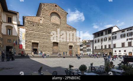 The unfinished stone facade of the Basilica di San Lorenzo seen across the Piazza San Lorenzo.  The original church was  consecrated in 393 AD. Stock Photo