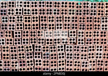 Red Brick Block Construction Equipment, Building Walls. Chau Doc. Vietnam. Stock Photo