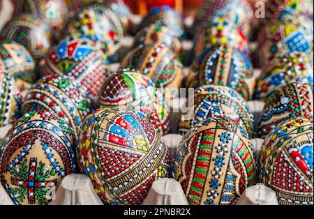 Colorful hand painted decorated Easter eggs. Romanian traditional decoration. Stock Photo
