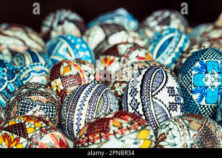 Colorful hand painted decorated Easter eggs. Romanian traditional decoration. Stock Photo